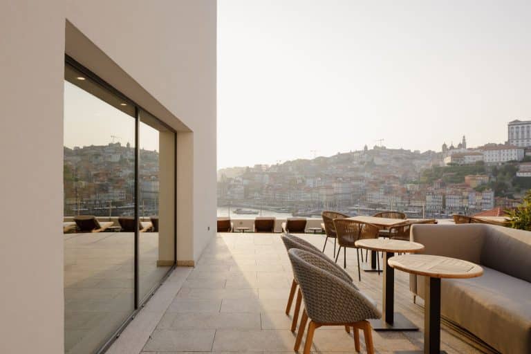 Porto River Soul hotel rooftop with river view and Rabelo boat. A fantastic view to the city of Porto